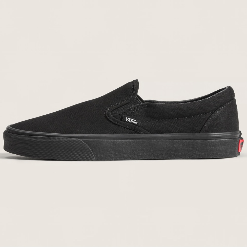 Vans WMNS Classic Black Slip-On Sneakers
Black/Black
VN000EYEBKA